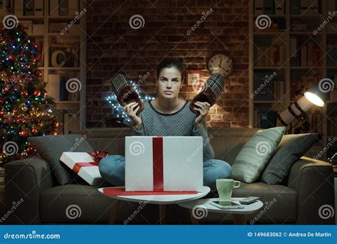 Woman Receiving a Disappointing Christmas Gift Stock Photo - Image of ...