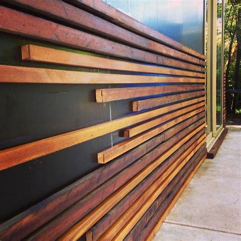 External cladding made from 1970s cedar wall panels and unidentified ...