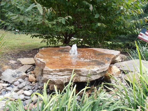 The newest style of fountain we have made. A beautiful slab rock with a ...