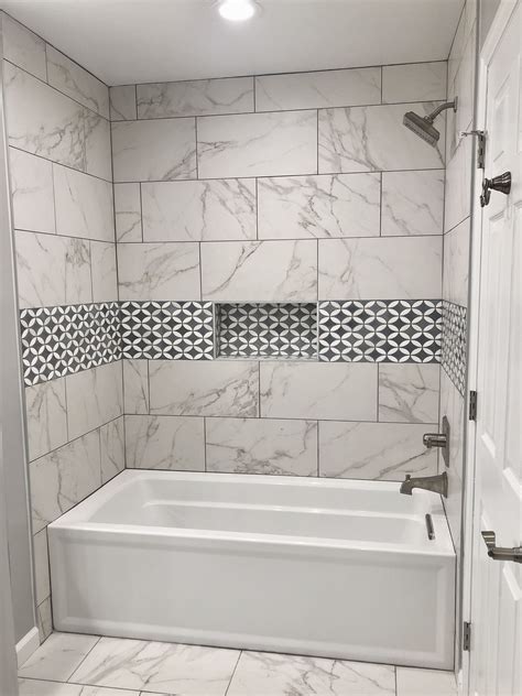 White Marble Shower With Accent Tile