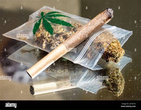 Joint with cannabis drug weed smoke Stock Photo - Alamy