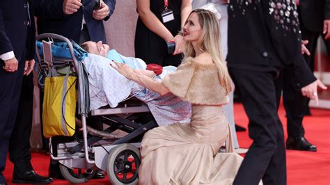 Angelina Jolie Stops on Venice Red Carpet to Chat With Bed-Ridden Fan