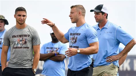 Christian McCaffrey and his dad surprise military family for Father's ...