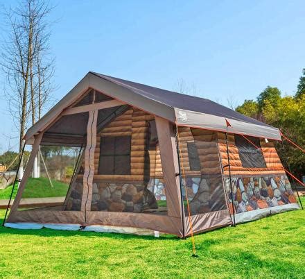 This Log Cabin Tent Has a Giant Screened In Front Porch For a True ...