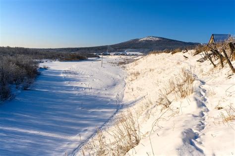 Premium Photo | Russian snowy village in winter ural mountains russia