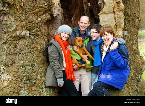 Smiling Family Outdoors Stock Photo - Alamy