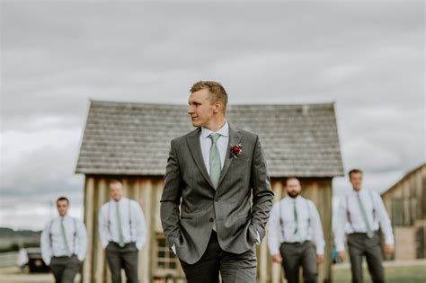 Stylish Groom in Grey Suit and Sage Green Tie