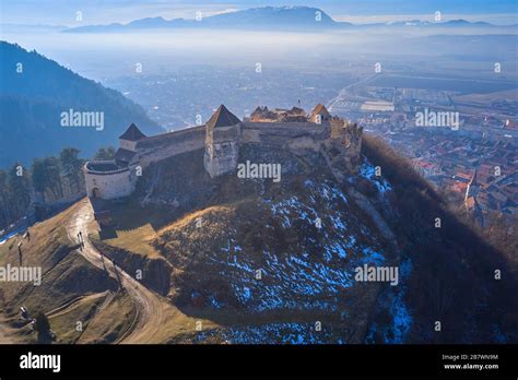 Aerial view of View of Rasnov Fortress and Rasnov city in Brașov ...