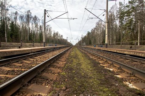 Parallel Railway Tracks With Railway Station Stock Photo - Image of ...