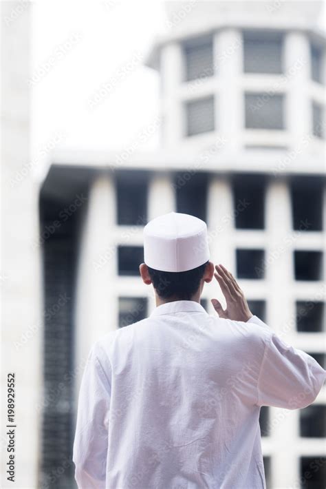 Muslim man doing azan in the mosque Stock Photo | Adobe Stock