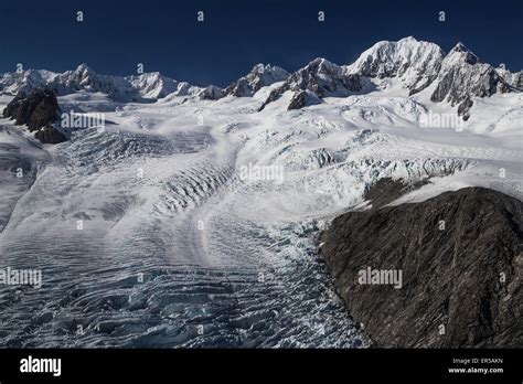 Fox Glacier And Mount Tasman Are Seen From An Aerial Perspective Along