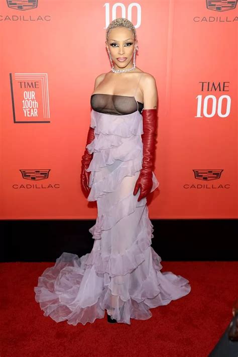 Doja Cat Exposes Bare Chest In Transparent Dress As She Steals Show At