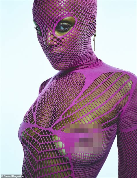 Doja Cat Goes TOPLESS In Fishnet Body Stocking For Quirky Dazed