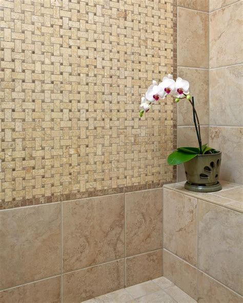 A great guideline is always to buy about 20% more than you think that will want. Shower With Basket-Weave Tile | Basket weave tile, Blue shower tile, Mosaic bathroom tile