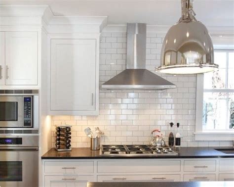 This curved glass stainless steel range hood looks beautiful over this kitchen island. SV400B2-30" Wall mount range hood- (Clearance) | Kitchen ...