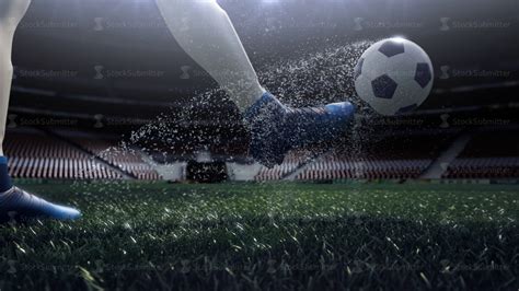 Close Up View Of Soccer Ball And Player Leg Shooting To The Goal In