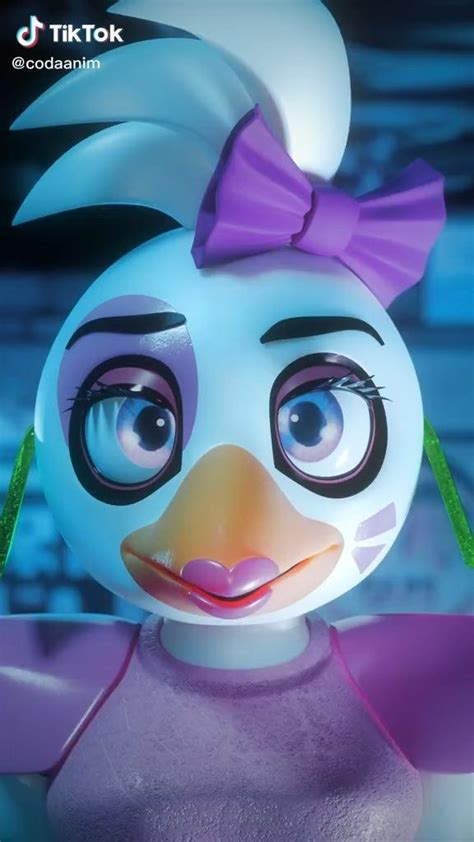 A Close Up Of A Cartoon Character With Big Eyes And A Purple Bow On Her