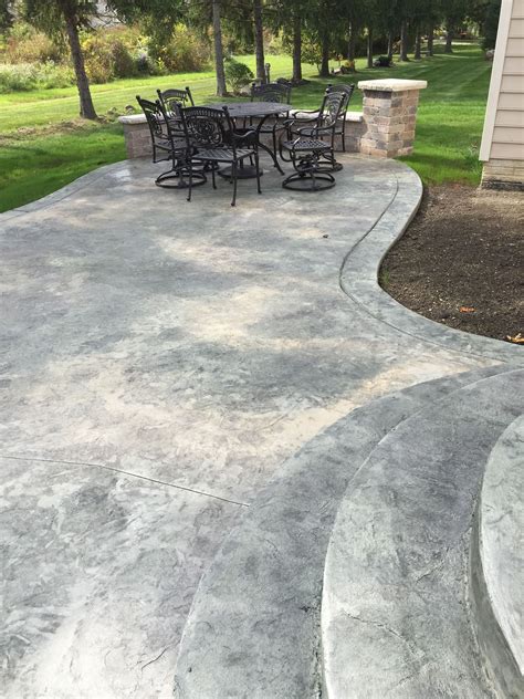 Beautiful Stamped Concrete Patio With Marbled Coloring By Ground Works