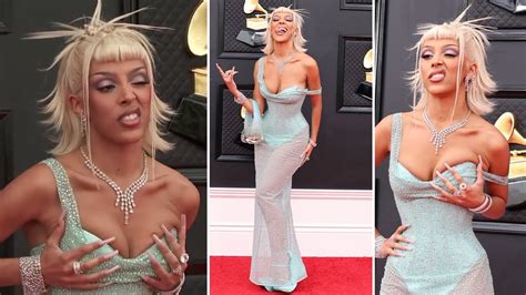 Doja Cat Cups Her Cleavage In Sheer Gown At Grammys Youtube