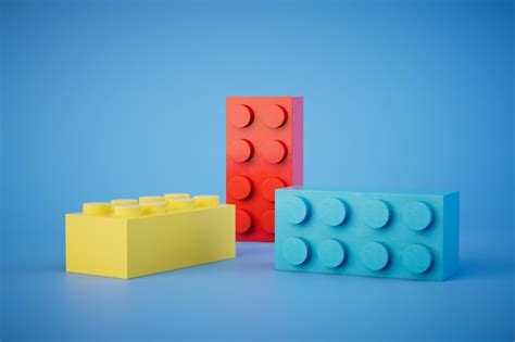 Premium Photo Multicolored Lego Blocks On A Blue Background 3d Render