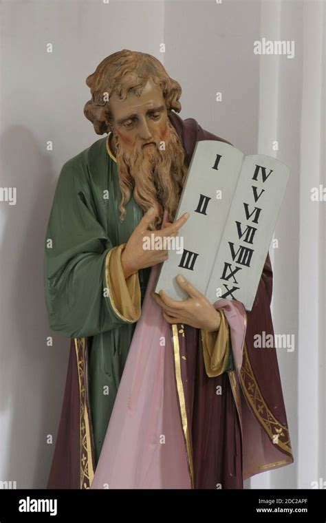 Moses Holding The Ten Commandments Stock Photo Alamy