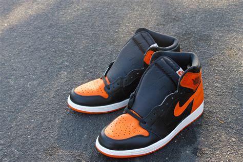 This colorway was inspired by the orange and black jersey that michael wore when he shattered a backboard in an italian exhibition game in 1986. Air Jordan 1 Black Orange Shattered Backboard Custom ...