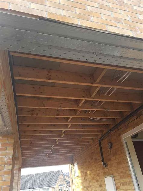 Steel garage doors are naturally insulated better than wooden garage doors. carport ceiling - Heat Insulation - BuildHub.org.uk