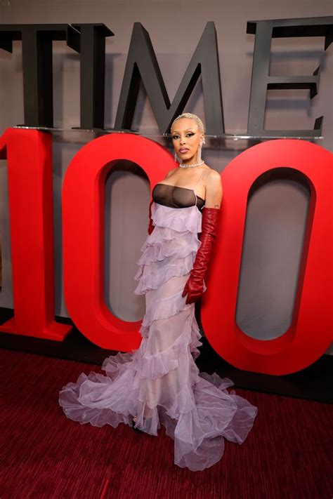 Doja Cat Exposes Bare Chest In Transparent Dress As She Steals Show At