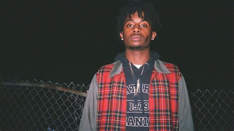 How playboi carti emerged from the atlanta underground | gq. playboi carti is wearing red striped coat standing in ...