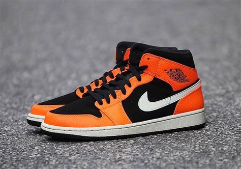 This colorway was inspired by the orange and black jersey that michael wore when he shattered a backboard in an italian exhibition game in 1986. Air Jordan 1 Mid Black Orange 554724-062 Buy Now ...