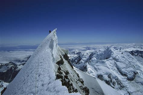 Climber On Summit Of Mount Cook Photograph By Ned Norton Pixels