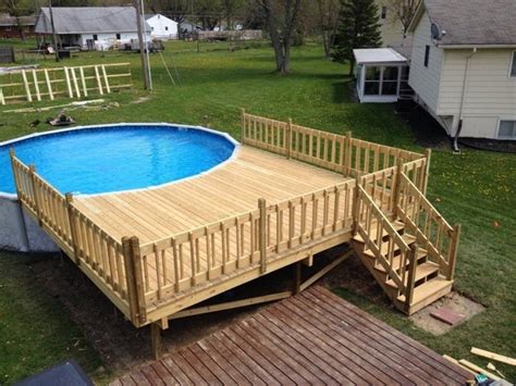 The stock tank pool kit: Image of: Above Ground Pool Deck Plans 27 Ft Round | Pool ...