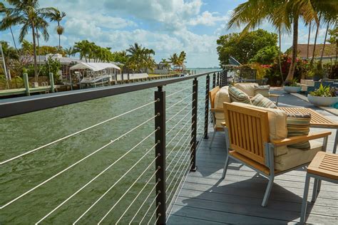 Midwest homeowners that want deck railing that truly embodies strength and beauty should choose our composite deck railing. Cables for a Bal Harbour Deck - Viewrail