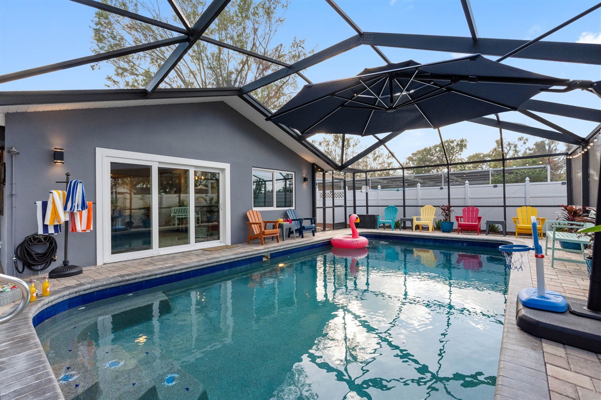 This beautifully designed pool invites you to take a refreshing dip any time of year, allowing you to enjoy the water regardless of the season.