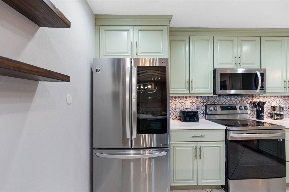 With generous counter space, the kitchen provides plenty of room for meal preparation, making it easy to chop, mix, and assemble your culinary creations.