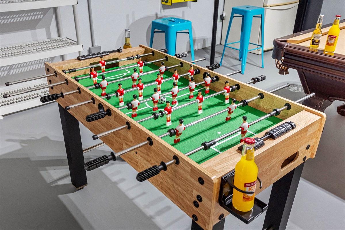 The classic foosball table invites friendly competition.