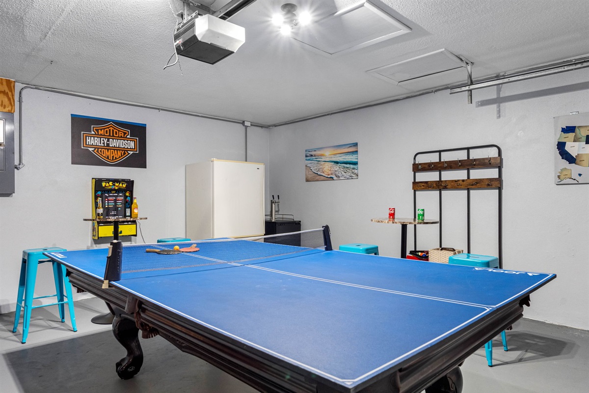 The pool table stands as the centerpiece of the room, providing an excellent space for a classic game of billiards.