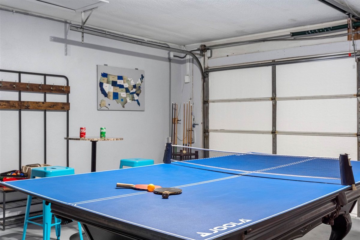 The versatile pool table easily converts into a ping pong table, giving guests the flexibility to switch between games.