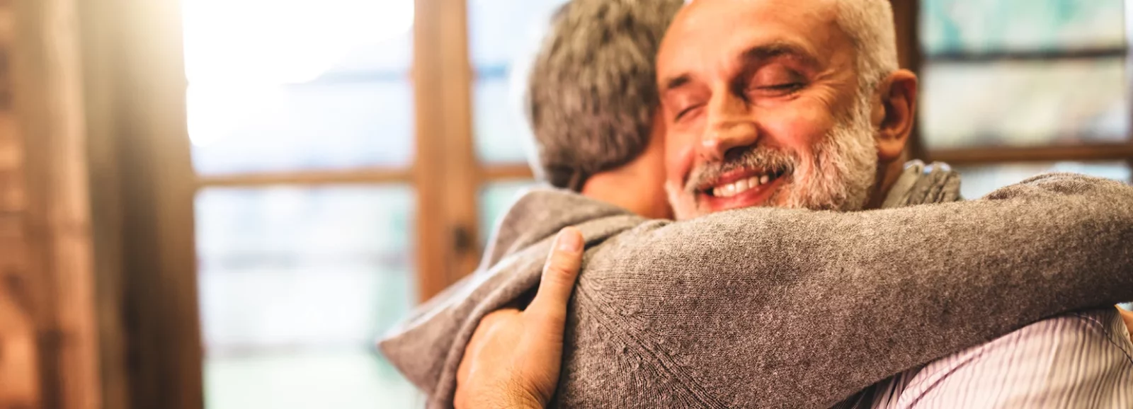 Man hugging his wife