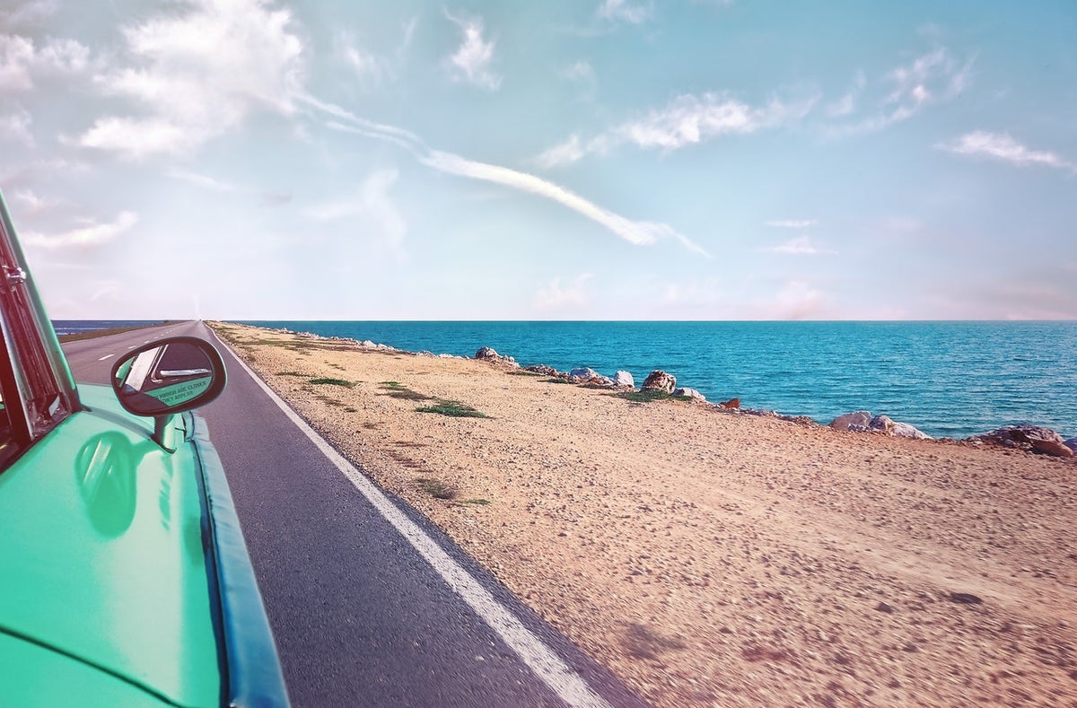 car driving near ocean