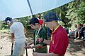 Varsity Scouts (BSA) shooting blackpowder rifles in 2004 .