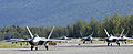 Six F-22 Raptors taxi following touchdown at Elmendorf Air Force Base, Alaska, during a ceremony marking the aircraft's arrival Aug. 8 2007. The F-22s will join the active duty 3rd Wing and Air Force Reserve Command's 477th Fighter Group here. The 477th FG becomes the first Air Force Reserve unit to operate and maintain the F-22.