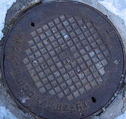 Lithuanian SSR standard manhole cover of the city water main in Vilnius