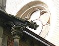 Gargoyle on the wall of the mausoleum