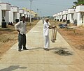 A fisherman in Wooster Nagar, India, demonstrates his net-throwing technique.