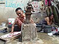 People doing laundry, Jakarta