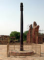 The iron pillar in the Qutb complex, Delhi, India.