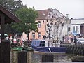 English: A boat in the harbour channel in the centre of Łeba Polski: Łódź na kanale portowym w centrum Łeby