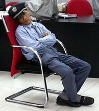 Bank-Security-Guard-Sleeping-Cropped.jpeg