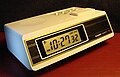 Clock displays "PM". Light of CCFL leftside the clock radio only.